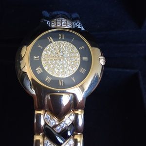 VERSACE VINTAGE 18KT GOLD AND DIAMOND WATCH